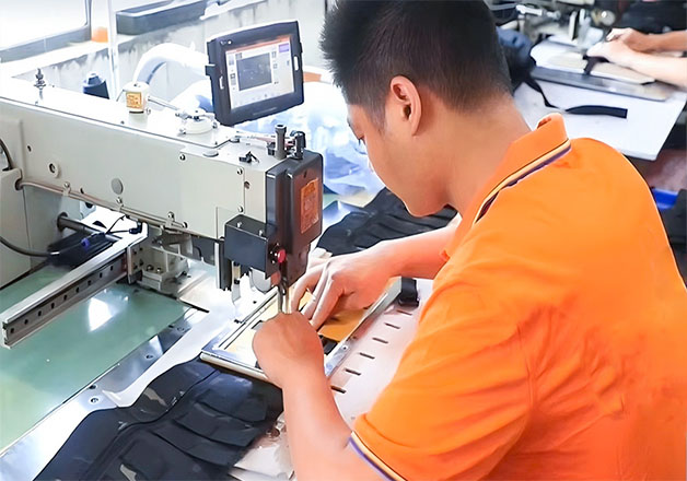 workers in bag production line