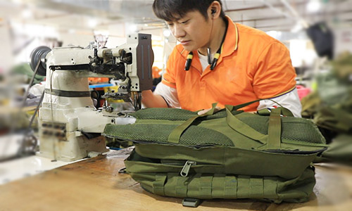 Stitching bag worker